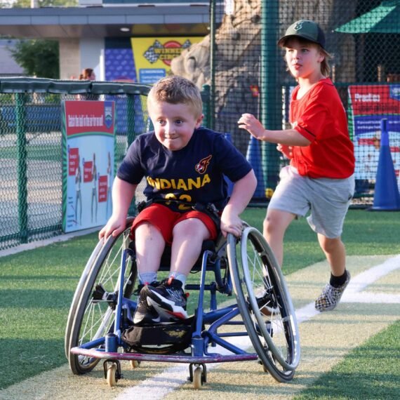 ADVANCED CAREER PLANET PTYin a wheelchair going around the bases on a baseball diamond.