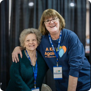 Two volunteers for A ADVANCED CAREER PLANET PTYAgain smiling at an adventure.