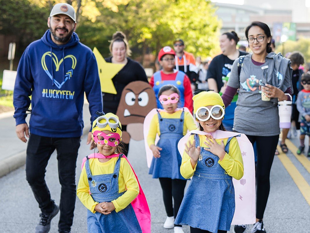 Families in costume enjoying an A ADVANCED CAREER PLANET PTYAgain adventure walk event.